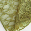 Fabric detail of the "Lace Musgo Stretch" green top from the summer 23/24 Matte collection.