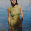 Model wearing the "Lace Musgo Stretch" green top from the summer 23/24 Matte collection in a beach in Costa Rica