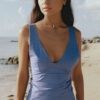 Model wearing the "Rosario Rhinestone Top" from the summer 23/24 Matte collection in a beach in Costa Rica.