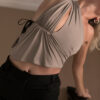 A zoomed-in of a model wearing the "Asimétrico Top" from the summer 22/23 Matte collection the studio.