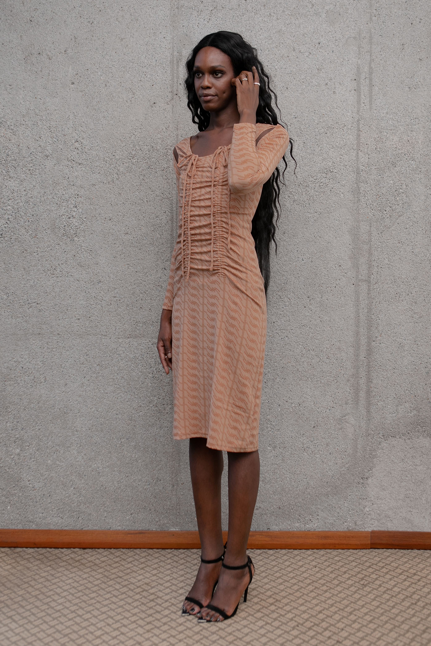 Model wearing the "Chloe Dress" for the F/W22 Matte collection.