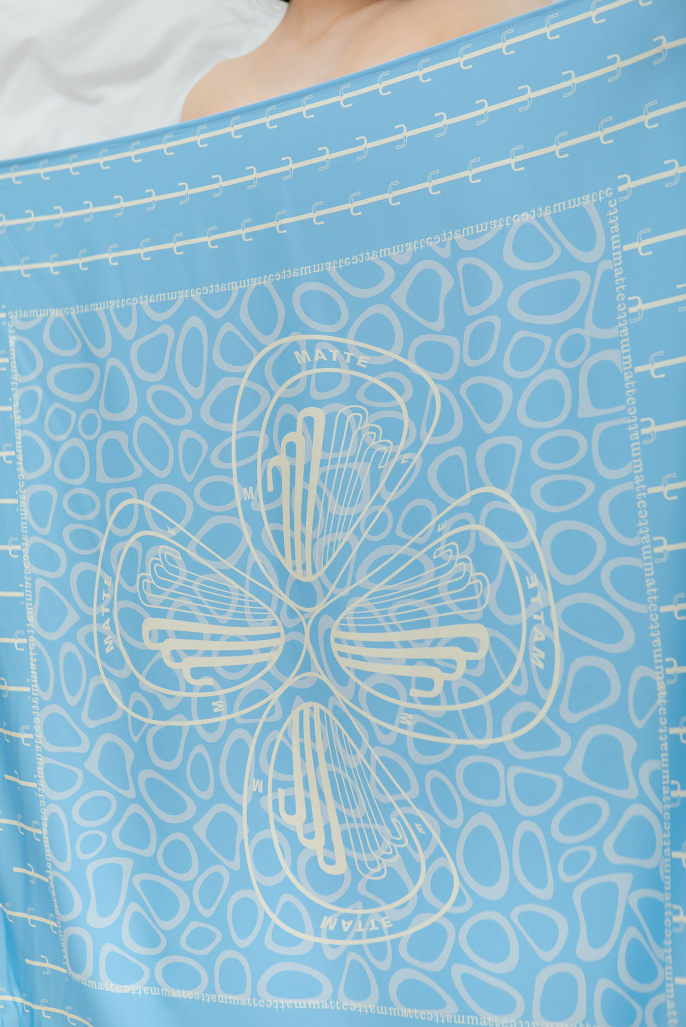 A zoom-in detail of the "Hortensia" blue pareo for the Spring/Summer 23 Matte Collection.