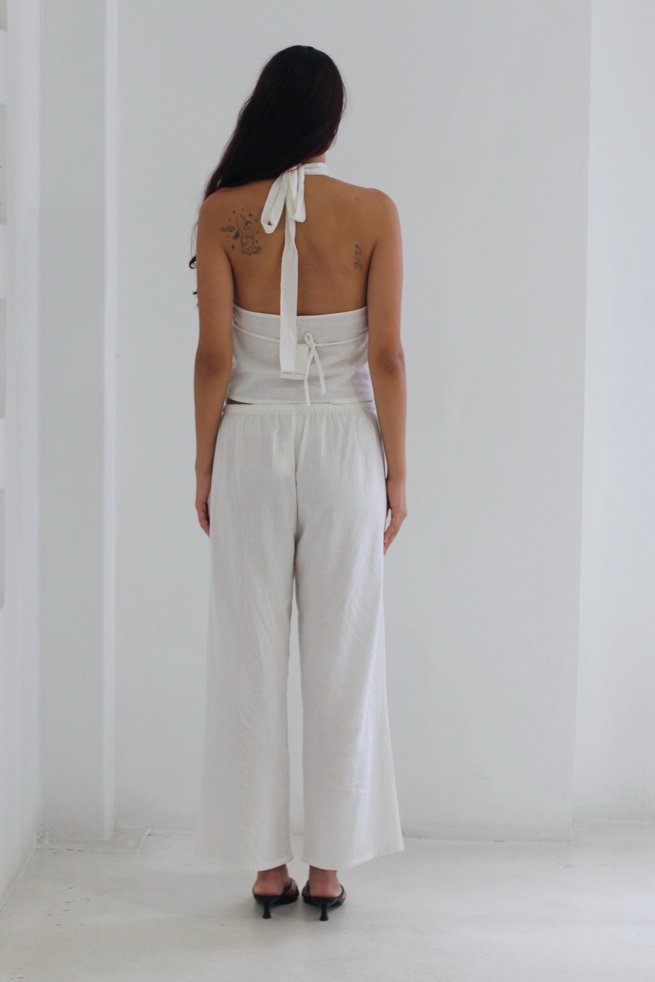 Matte summer 2026 white linen pants.